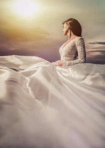 Fantasy princess wearing floaty dress at sunset birthday card
