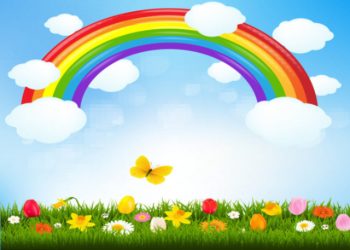 Rainbow in sky above flower meadow birthday card