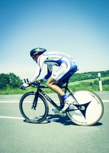 Male cyclist in a race birthday card
